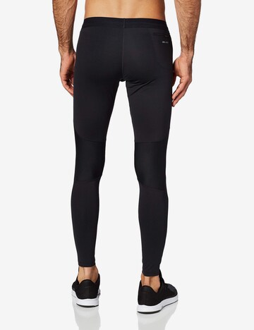 NIKE Skinny Sporthose in Schwarz