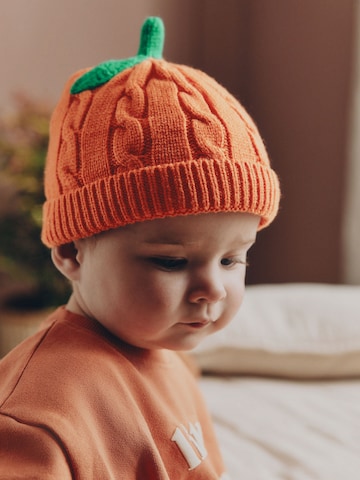 Next - Gorra en naranja