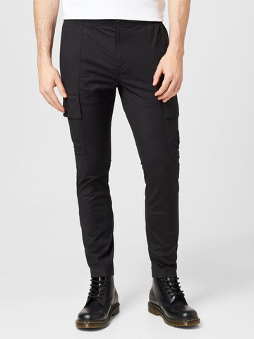 Skinny Pantalon cargo Calvin Klein Jeans en noir : devant