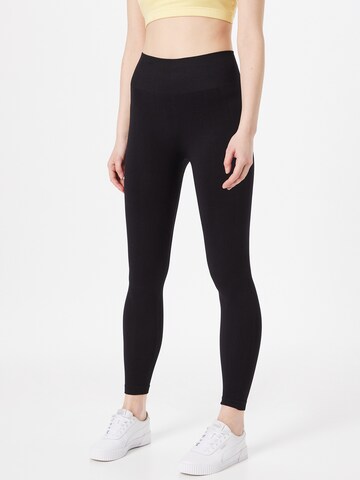 Athlecia Skinny Sportbroek 'Okalia' in Zwart: voorkant