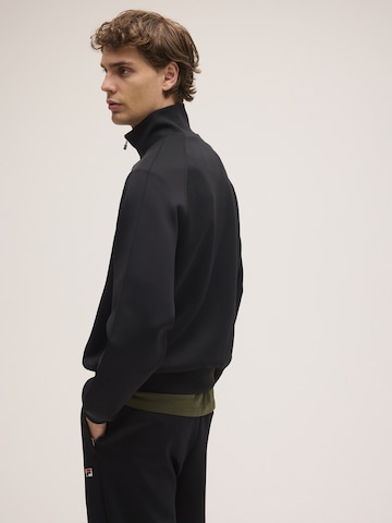Veste de survêtement 'CAVALESE regular track jacket' FILA en noir