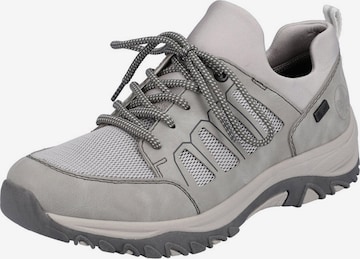 Chaussure de sport à lacets Rieker en gris : devant