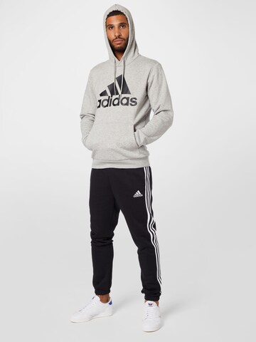 ADIDAS SPORTSWEAR Ozke Športne hlače 'Essentials Fleece Tapered Elastic Cuff 3-Stripes' | črna barva