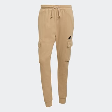 ADIDAS SPORTSWEAR Tapered Workout Pants in Beige: front
