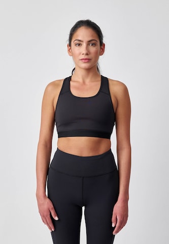 SNOCKS Medium Support Sports Bra in Black: front