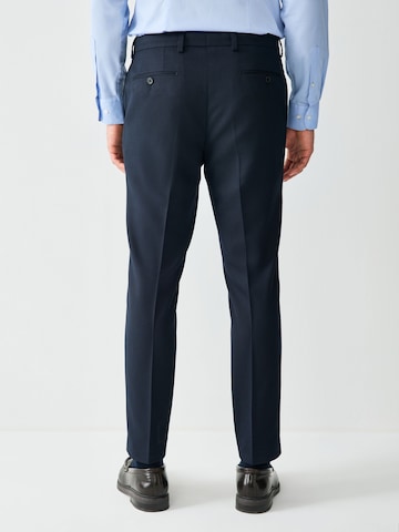 Coupe slim Pantalon à plis Next en bleu