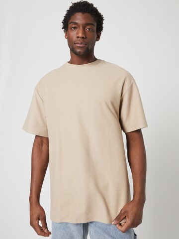 T-Shirt ABOUT YOU x Louis Darcis en beige : devant