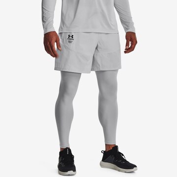 UNDER ARMOUR Regular Workout Pants in White: front