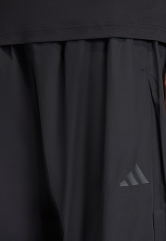 ADIDAS SPORTSWEAR - Pierna ancha Pantalón deportivo 'City Tech' en negro