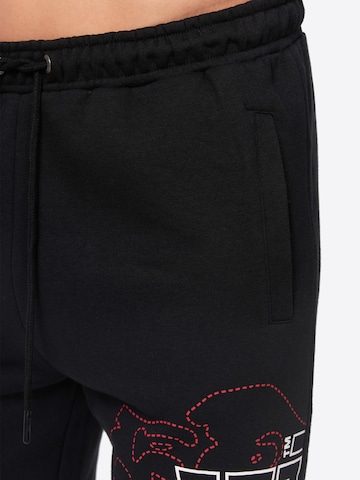 LONSDALE Конический (Tapered) Штаны 'Dartford' в Черный