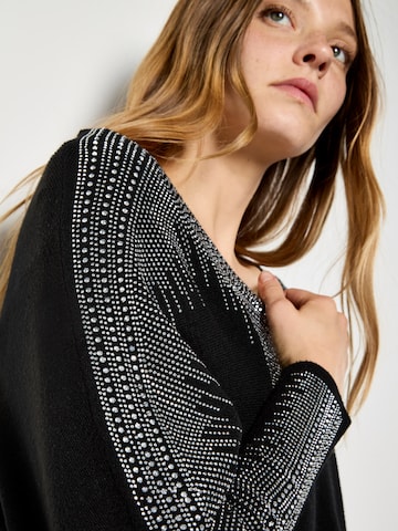 Pull-over ' ' Apricot en noir