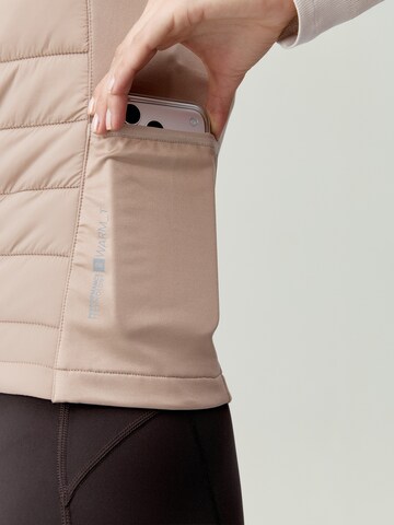 Skinny Gilet de sport ' Vortex ' Born en beige