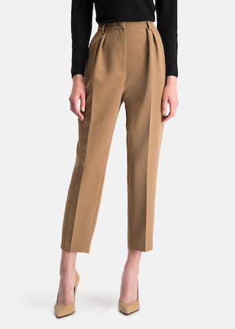 Nicowa Loose fit Pants in Beige: front