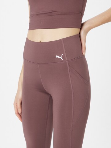 Skinny Pantaloni sportivi di PUMA in lilla