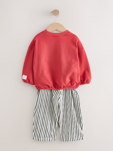 Set Next en rouge