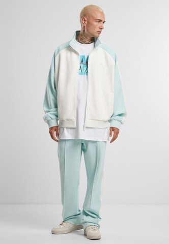 Regular Pantalon Karl Kani en bleu