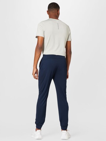 Tapered Pantaloni sportivi di J.Lindeberg in blu