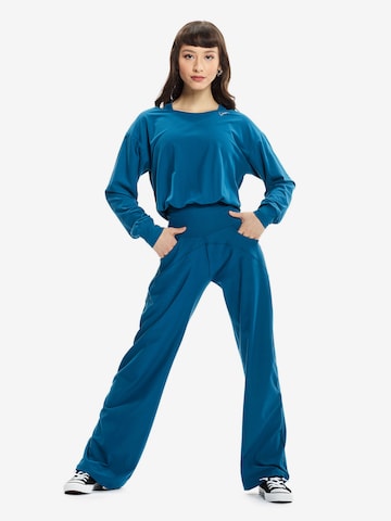 Winshape Jumpsuit ' JS101LSC ' i blå: forside