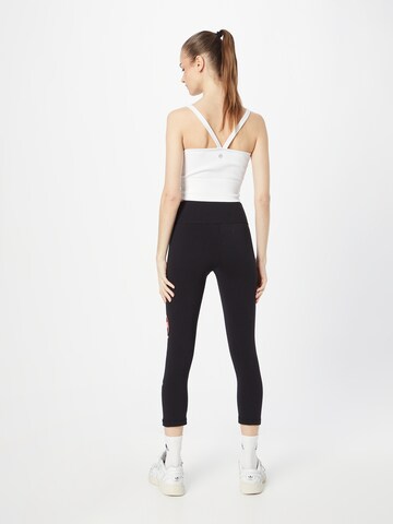 Skinny Pantalon de sport Champion Authentic Athletic Apparel en noir