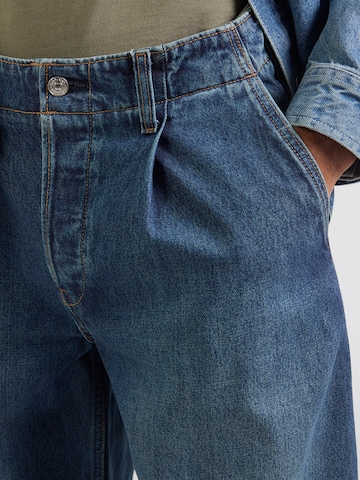 Calvin Klein Jeans Baggy Džíny se sklady v pase 'Benson' – modrá