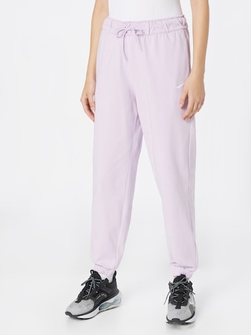 Nike Sportswear Tapered Trousers in Purple: front