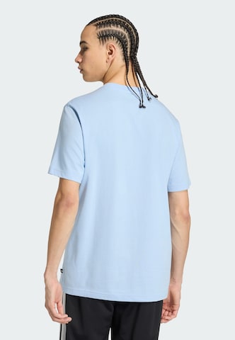 ADIDAS SPORTSWEAR Functioneel shirt 'Sketches Climbing' in Blauw