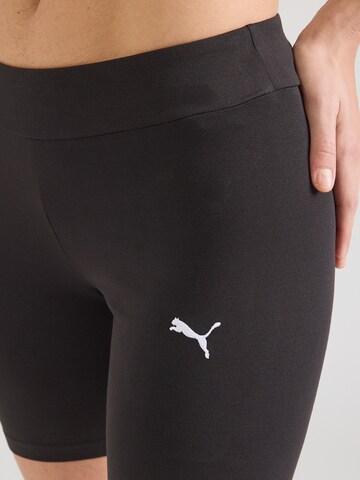 PUMA Skinny Športne hlače 'Ess' | črna barva