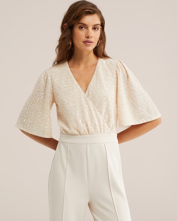 Salopeta de la WE Fashion pe bej