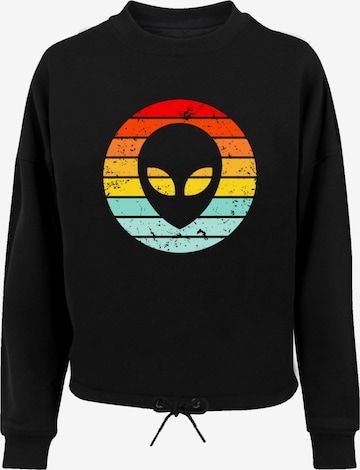 Sweat-shirt 'Alien Retro Sonnenuntergang' F4NT4STIC en noir : devant