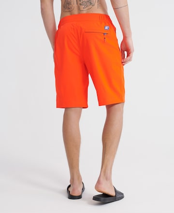 Superdry Skinny Badeshorts in Orange
