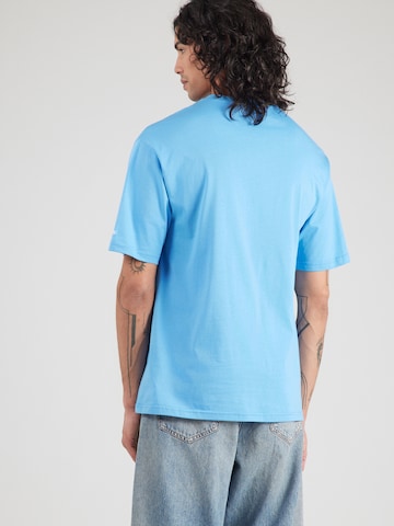 NEW ERA - Camiseta 'NEYYAN' en azul