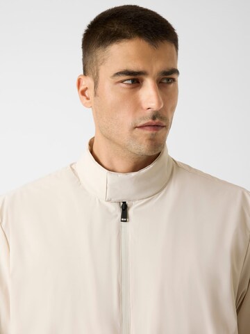 GUESS Between-Season Jacket in Beige