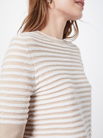 Pullover di comma casual identity in beige