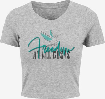 Merchcode T-Shirt 'Freedom At All Costs' in Grau: predná strana