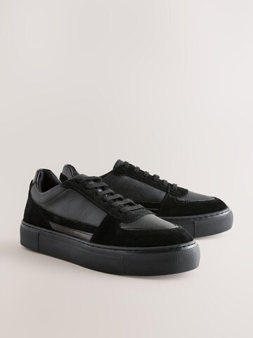 Baskets basses Next en noir