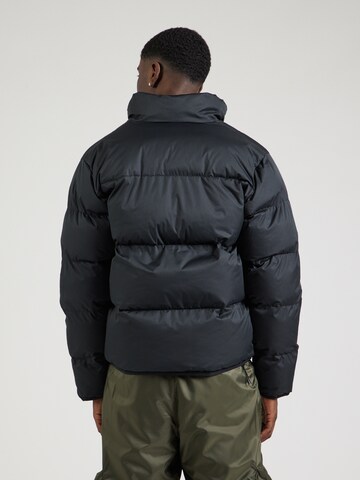 Veste d’hiver 'Club' Nike Sportswear en noir