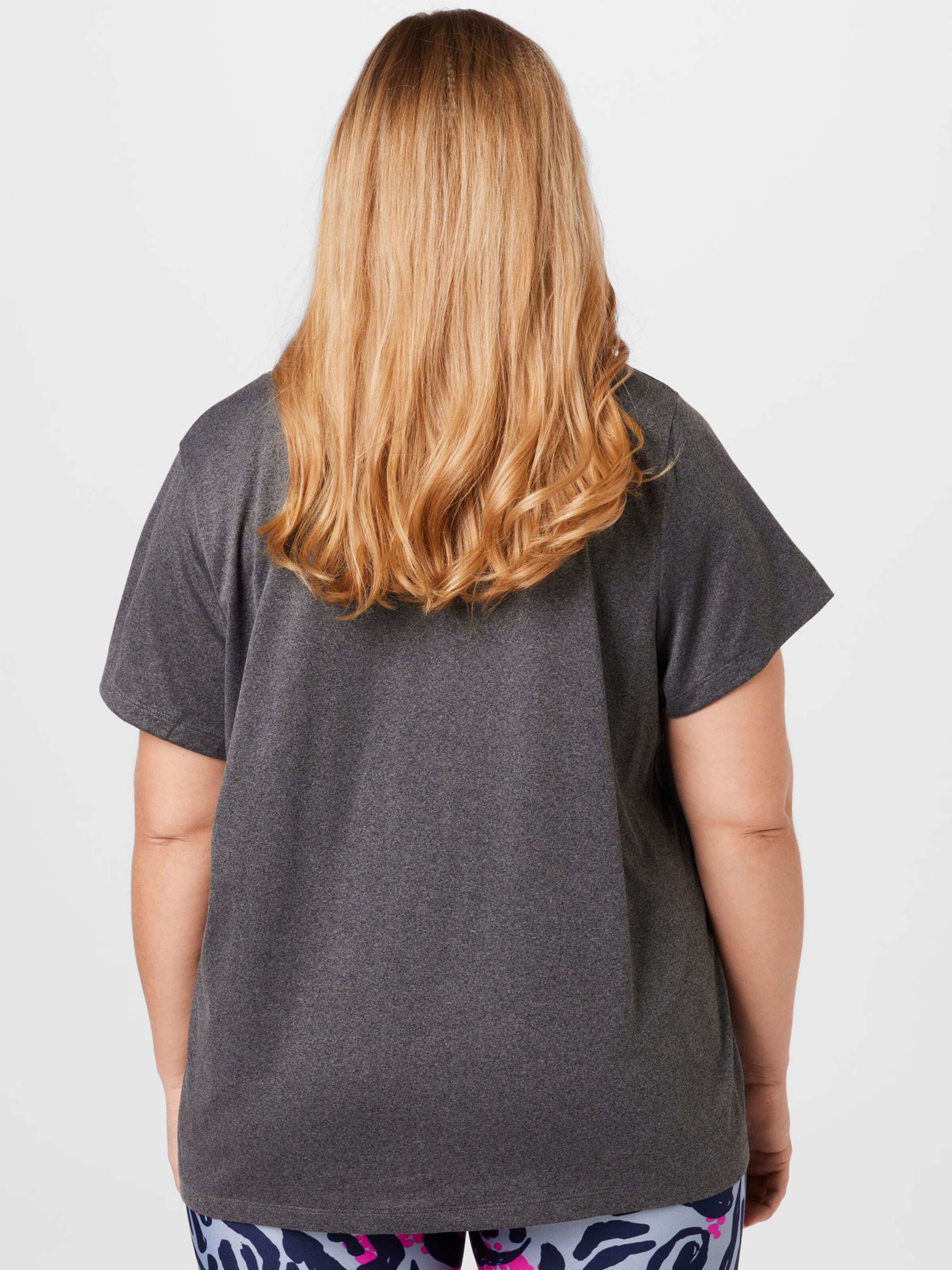 Femme T-shirt fonctionnel UNDER ARMOUR en Gris 
