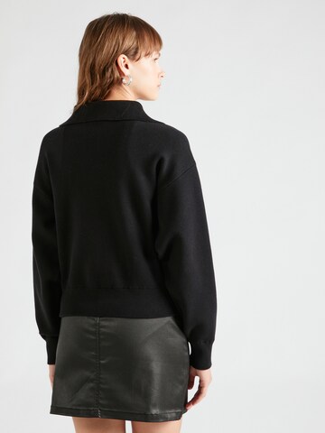 Pullover di DKNY in nero