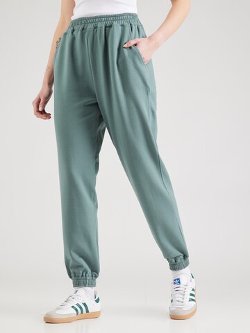 ABOUT YOU Tapered Trousers 'Naomi' in Green: front