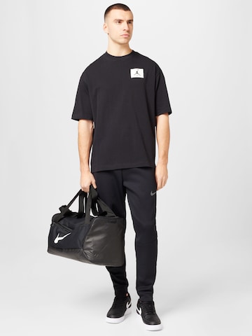 Jordan - Camiseta 'ESS' en negro