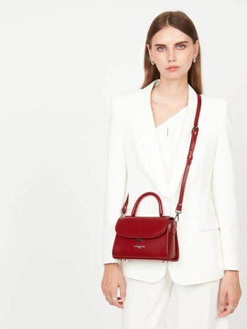 LANCASTER Paris Kabelka 'Lancaster Sac rabat cuir Suave Even Carmin' – červená