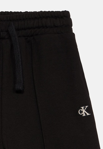 Wide leg Pantaloni de la Calvin Klein Jeans pe negru