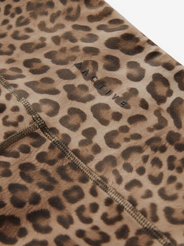 Skinny Leggings di Next in marrone