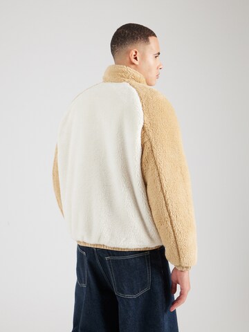 Giacca di pile di Tommy Jeans in beige