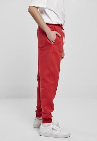 Urban Classics - Tapered Calças em vermelho