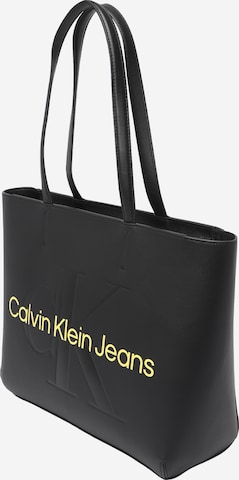 Plase de cumpărături de la Calvin Klein Jeans pe negru: față