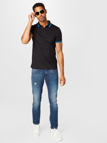 GUESS Poloshirt in Schwarz