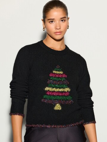 Next Sweater in Black: front
