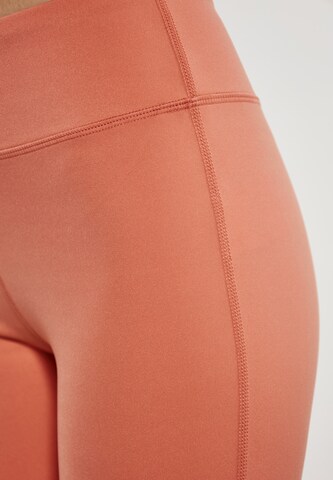 Skinny Pantalon de sport myMo ATHLSR en orange