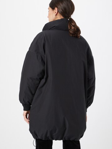 LEVI'S ® Between-season jacket 'Momo Rvs Down Pillowpuff' in Black